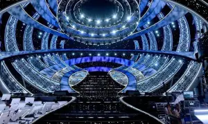 The dazzling stage for the San Remo Festival, illuminated with blue lights and starry effects, awaits its next performance.