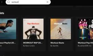 Spotify search results for "workout" show various workout playlist covers, including "Workout Playlist 20...", "WORKOUT RAP 20...", "Workout Beats", "Workout Pop Hits", and "Workout Rock Playlist".
