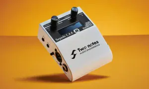 Two Notes Torpedo C.A.B. M, a white audio device with knobs and ports, offering free IR cabs for virtual cabinets.