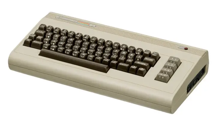 A classic Commodore 64 computer, a gateway to retro gaming and early computing, reminiscent of the era of Commodore 64 VST plugins.